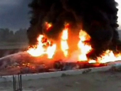 Afghan militants set fire to Nato fuel tankers