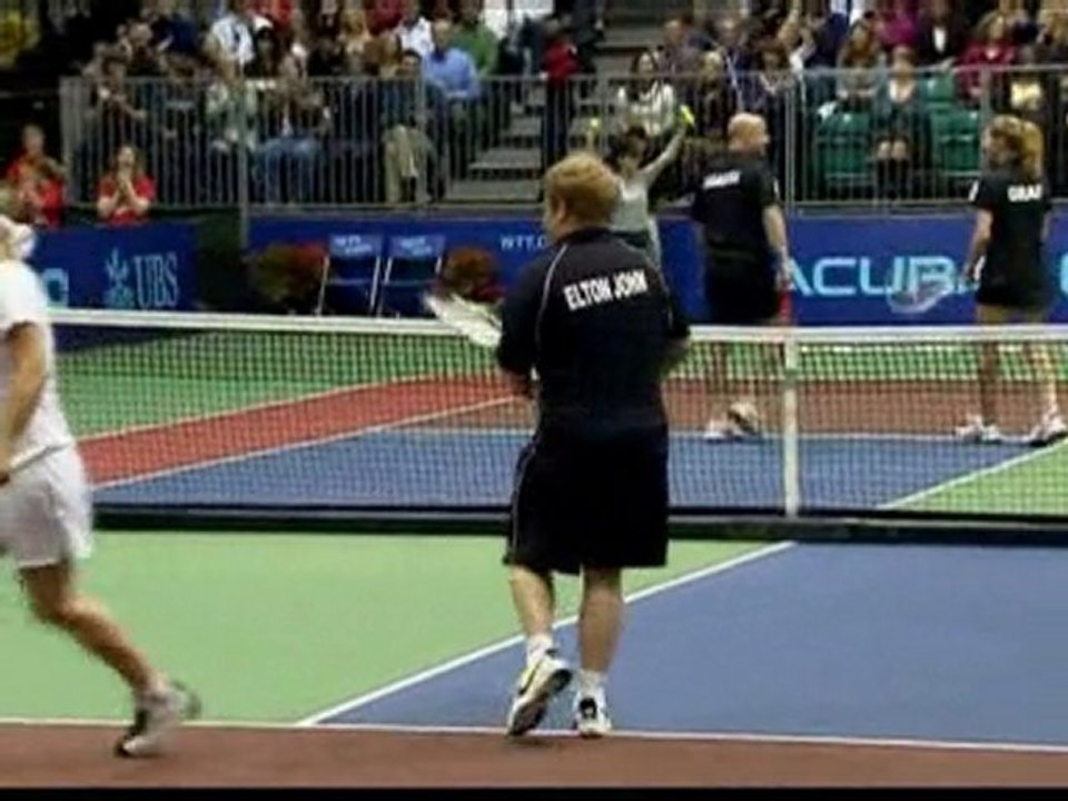 Elton John rocket beats Agassi