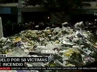 Duelo en China por fallecidos en incendio