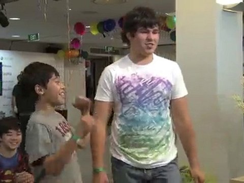 Brothers playing Kinect Sports for Xbox 360