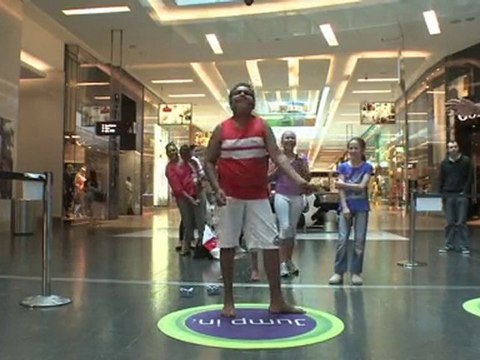 Funny boy playing Dance Central on Xbox Kinect