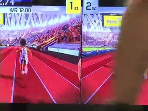 Two boys playing Kinect Sports for Xbox 360