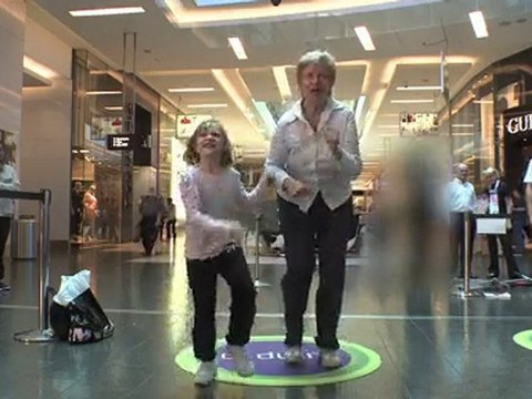 Grandma playing Kinect Sports for Xbox 360