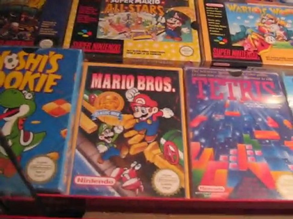 Jeux NES et SNES complet dans ma vitrine nintendo.