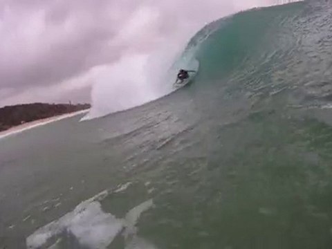 albert pollioni surfing tiny surfboard