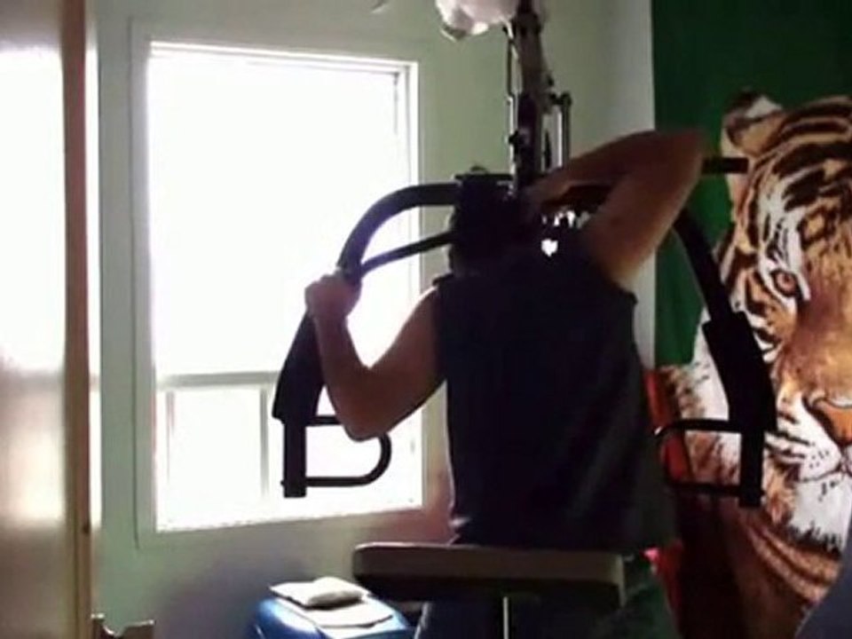 Guy Gets Ponytail Caught in Exercise Machine