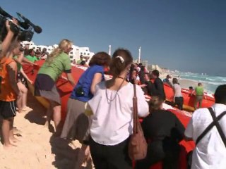 Cancun demonstrators rally for environment