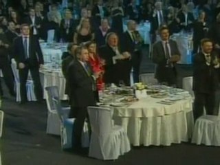 Vladimir Putin sings with Hollywood stars