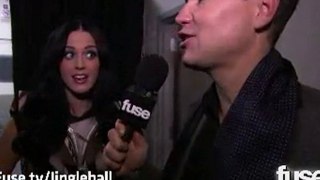 Katy Perry talks with Mark Hoppus before Jingle Ball 2010