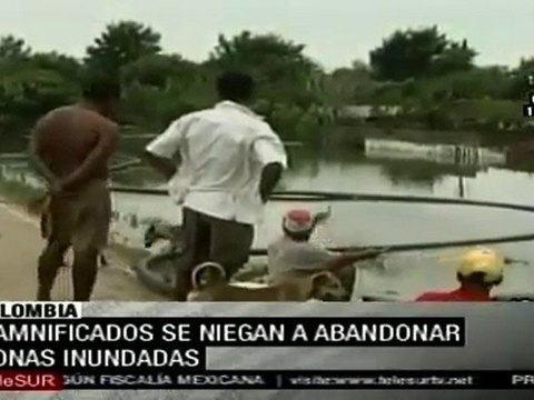 Damnificados por lluvias en Colombia permanecen en sus hogares