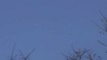 Daylight UFO flying over Naperville, Illinois 11-Feb-2010