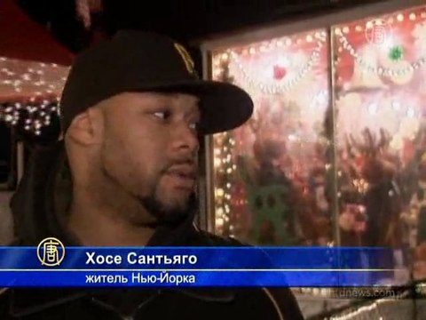 Рождественский домик зажигает огни в Нью-Йорке