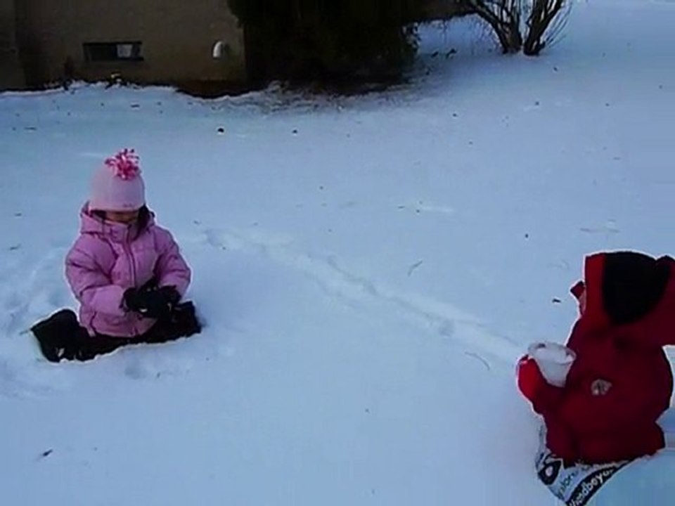 Sari and Justin playing in snow Dec 2010