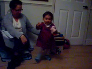 Zoe practising walking!!