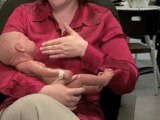 Formula And Bottle Feeding : How should I hold my baby during bottle feeding?