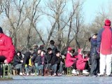 Chair 'skaters' take to frozen Beijing lakes