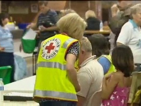 Brisbane braced as floods rise and people flee