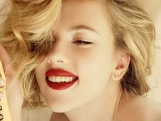 Scarlett Johansson Shows Leg In New Moët