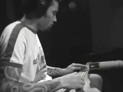 JOUER DE LA GUITARE COMME BEN HARPER