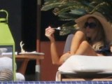 Kate Beckinsale looks amazing in a skimpy bikini