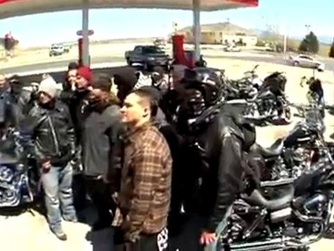 Pro-snowboarder Aaron Biittner riding snowboards and harleys