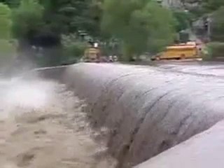 School bus crossing the river