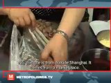 CHINESE FAMILY TV-COOKING DOG MEAT