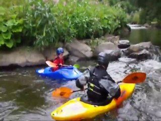 Jack paddling white water