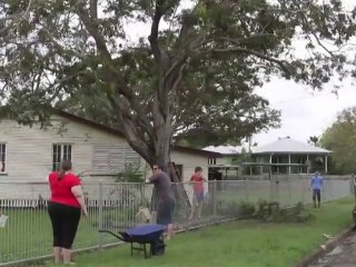 Queensland residents clear debris after storm