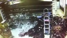 Wine shelf collapses