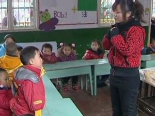 Handless boy eats and writes with his feet