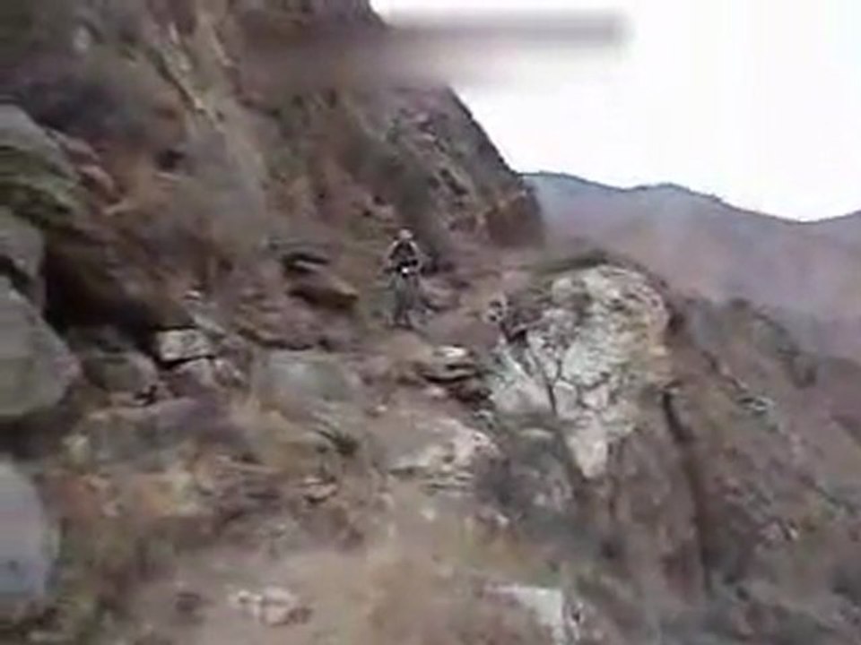 man falls down a mountain on mountainbike owch