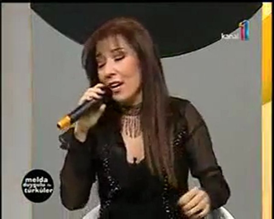 Melda DUYGULU-Siyah Saçlarında Hatem Yüzlerin