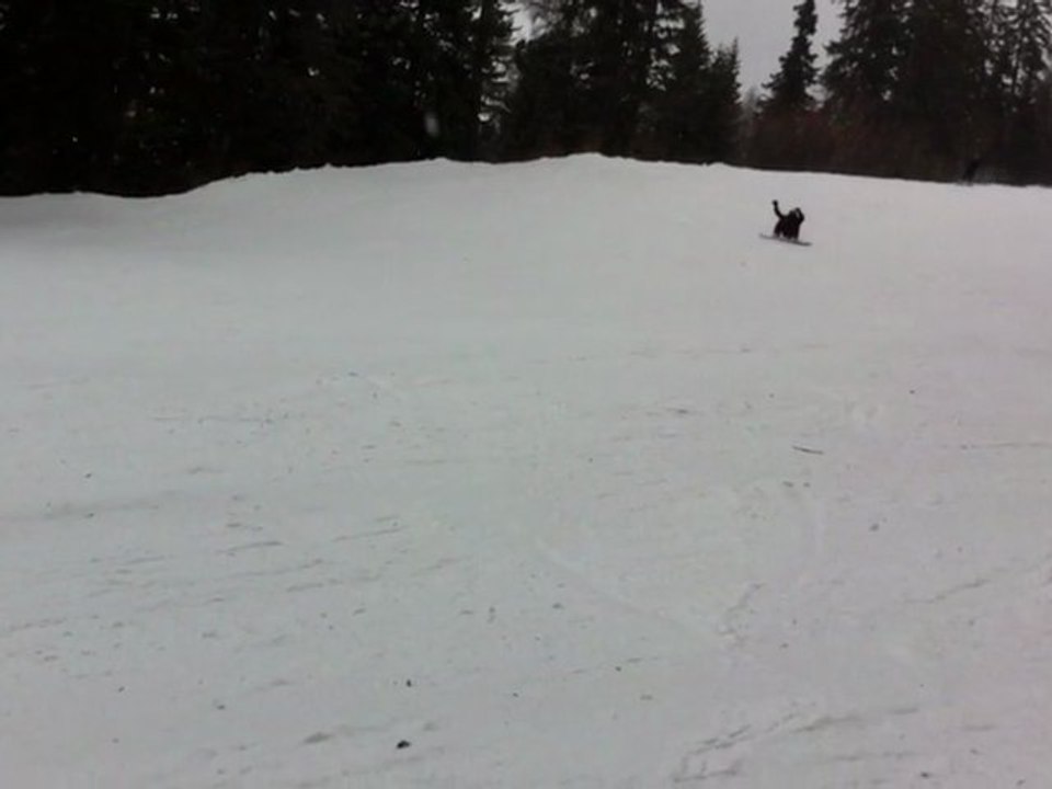 scotchman fait de la luge  sur un snow