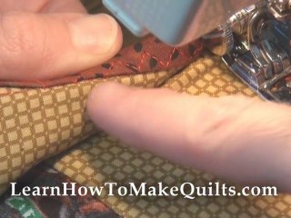 How to Bind a Quilt - Sewing the Binding on the Front
