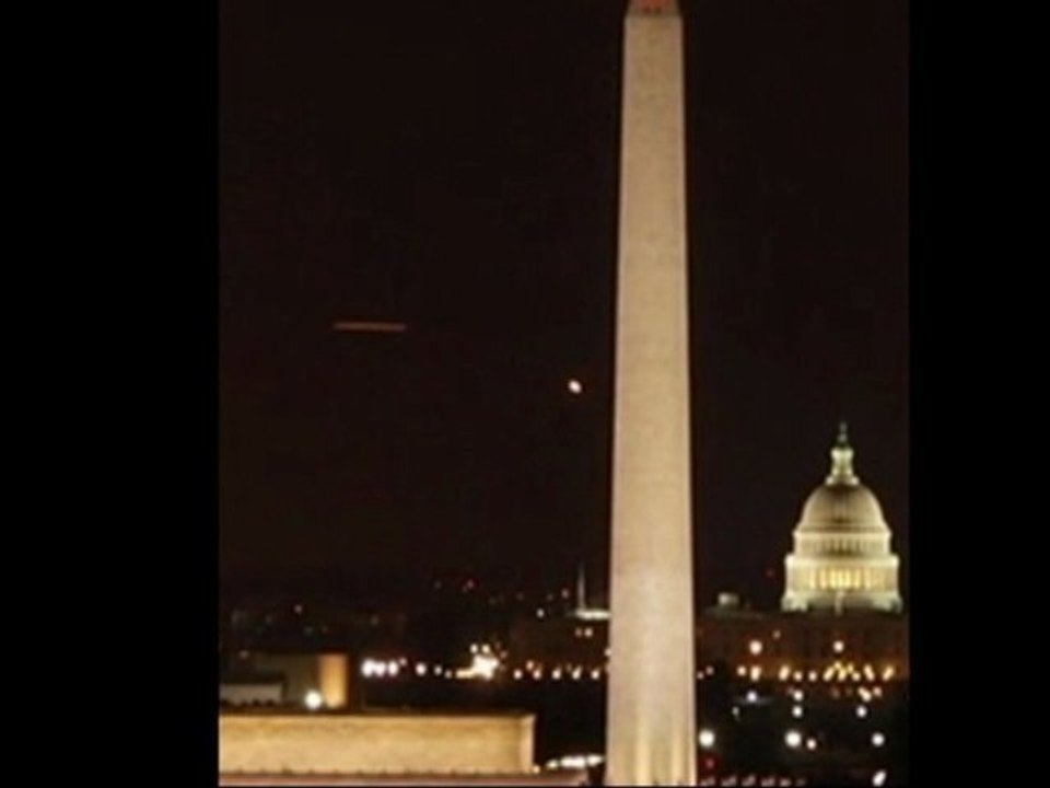 Cigar-shaped UFO Washington DC webcam 14-Feb-2011