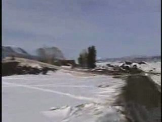 World Record snowmobile jump -- 263.5 ft