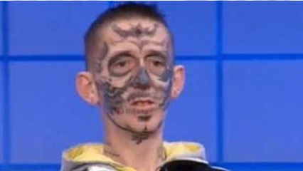 Batman tatoué sur le visage