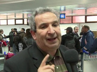 Tunisians living in Libya escape growing unrest