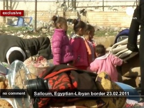 Egyptian workers flee Libya - no comment