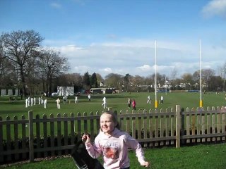 Josie bowling opening ball at charity cricket match