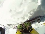 Skier loses footing, falls off huge cliff