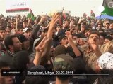 Libyan protesters burn Gaddafi book - no comment