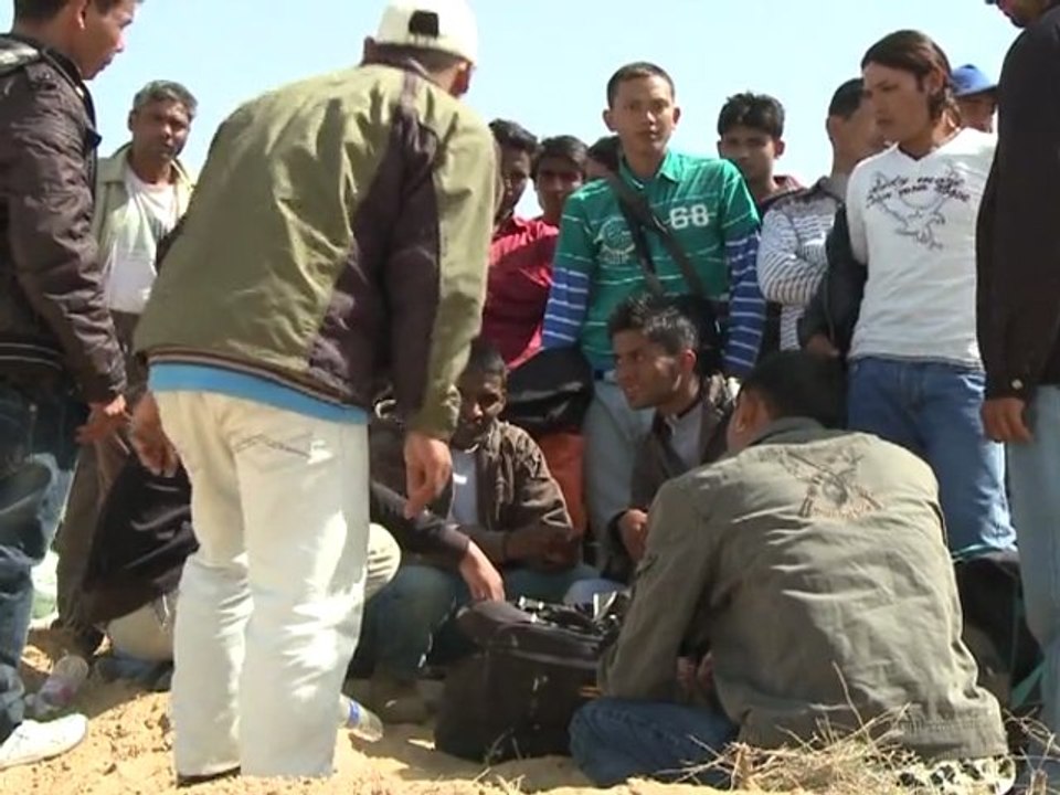 Safe from Libyan fighting but struggle continues for refugees