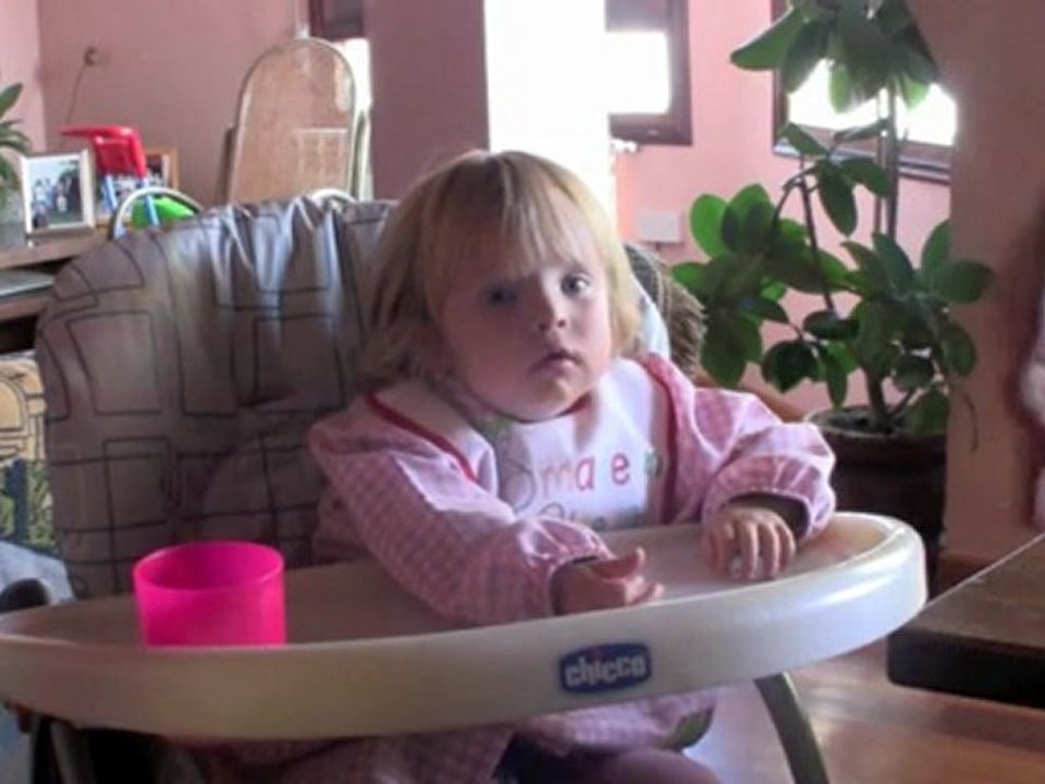 A girl eating potatoes