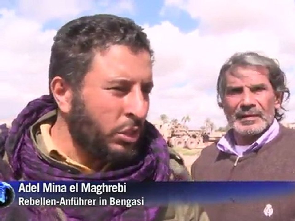 Libyen-Angriffe: Rebellen frohlocken, Gaddafi-Anhänger trotzig
