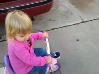 Sasha riding her bike in the neighborhood_Dec.2010