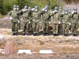 Japan buries tsunami victims in mass graves