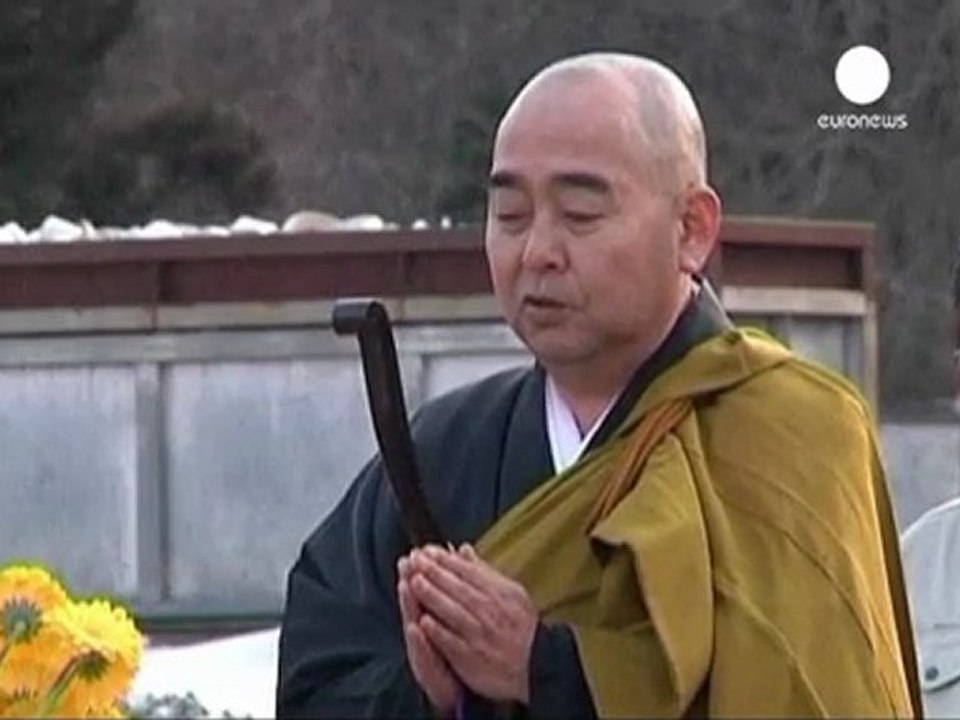 Temporary mass graves for Japan tsunami victims