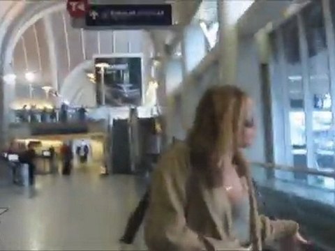 Miley Cyrus Covers Her Assets!